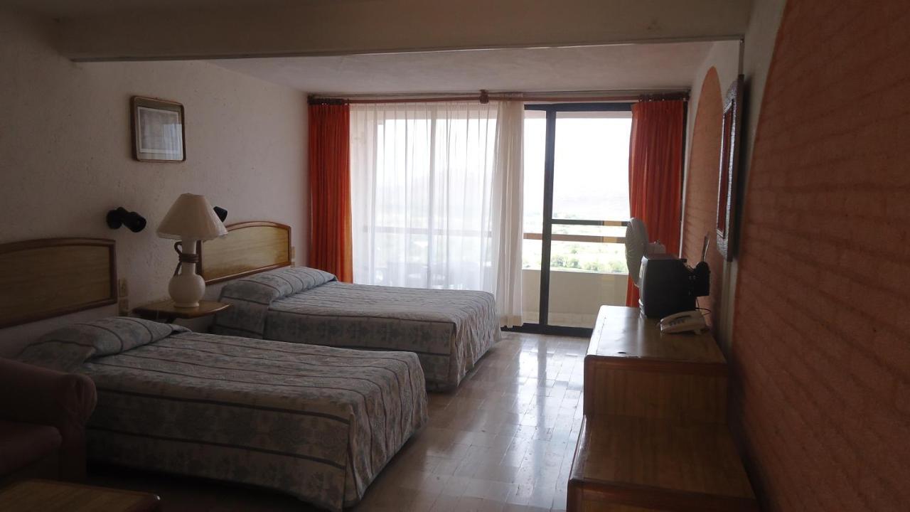 Hotel Piedras de Sol Solaris Morelos Tlaltizapán Habitación foto